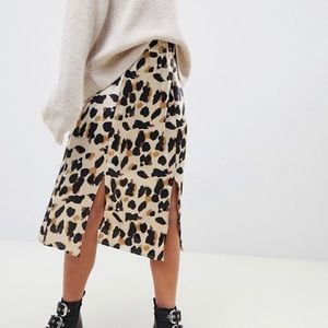 Satin leopard print skirt.